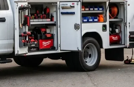 Service truck with its tool compartments open